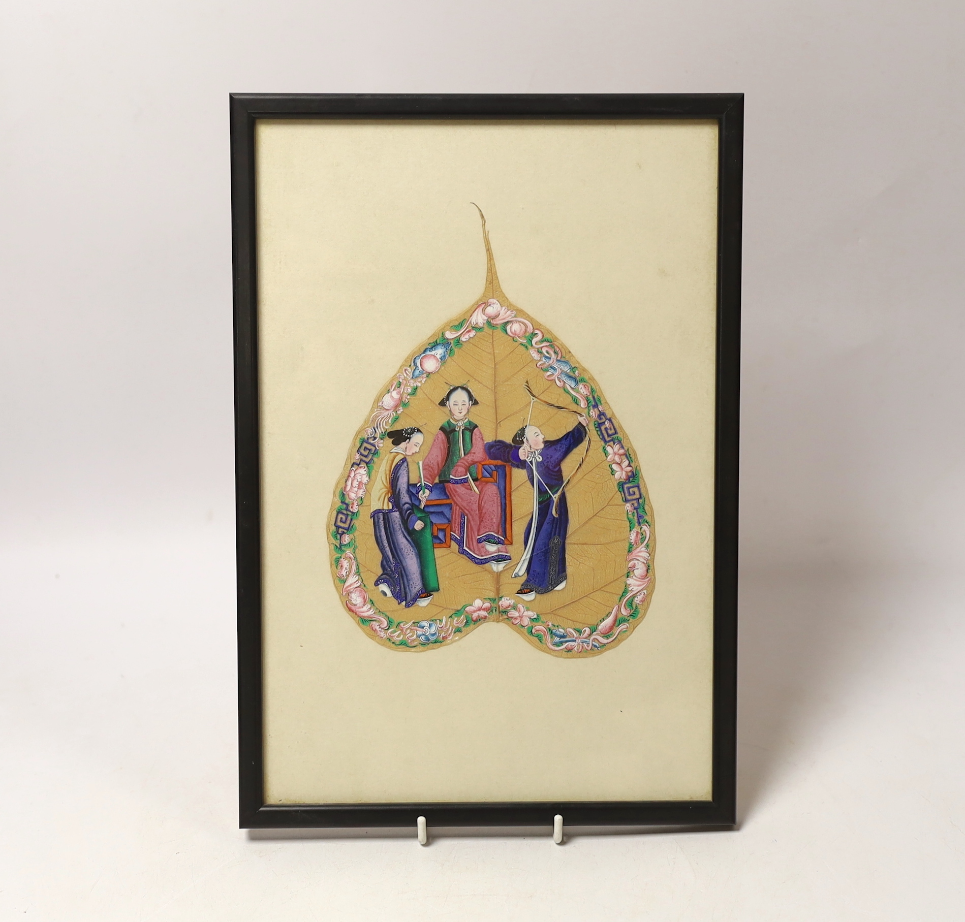 A 19th century Chinese figurative peepal leaf painting, framed, 29cm high x 19.5cm wide, including mount but not including frame